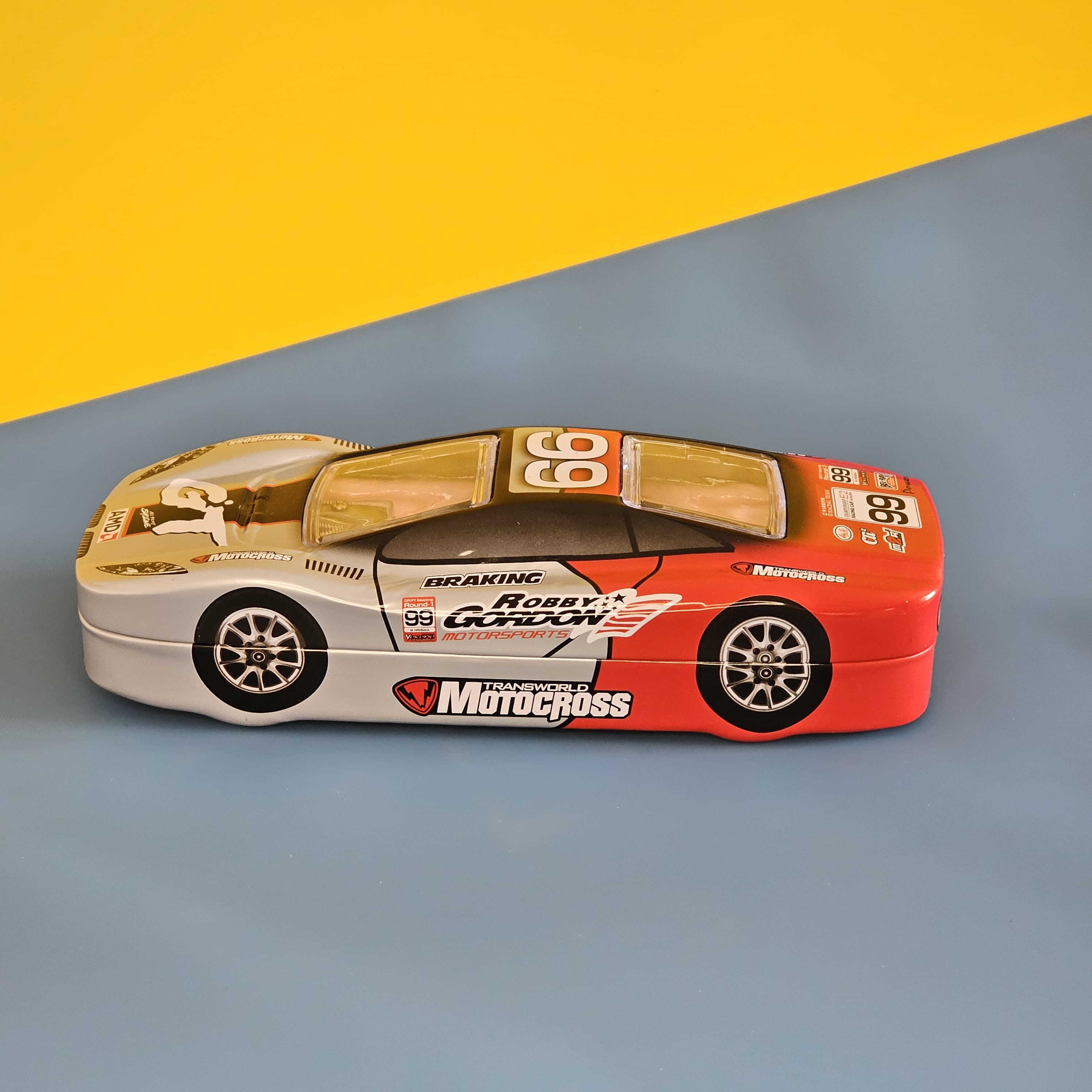 Race car-shaped pencil box for kids – Stylish and durable stationery organizer featuring a red and black sports car design, perfect for school supplies. Ideal gift for children and students."
This ALT text includes relevant keywords like "race car-shaped pencil box," "stationery organizer," "school supplies," and "gift for children" to improve search visibility. Let me know if you want any modifications